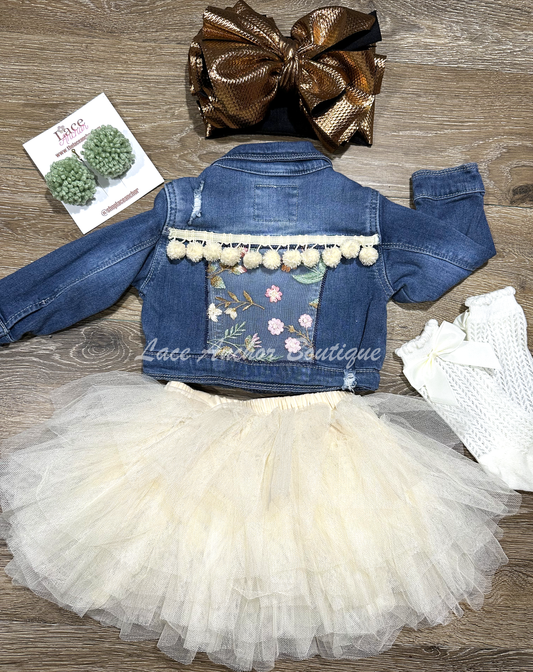 custom handmade upcycle toddler girls denim jacket with floral emboridered patch and ivory pom pom  trim.