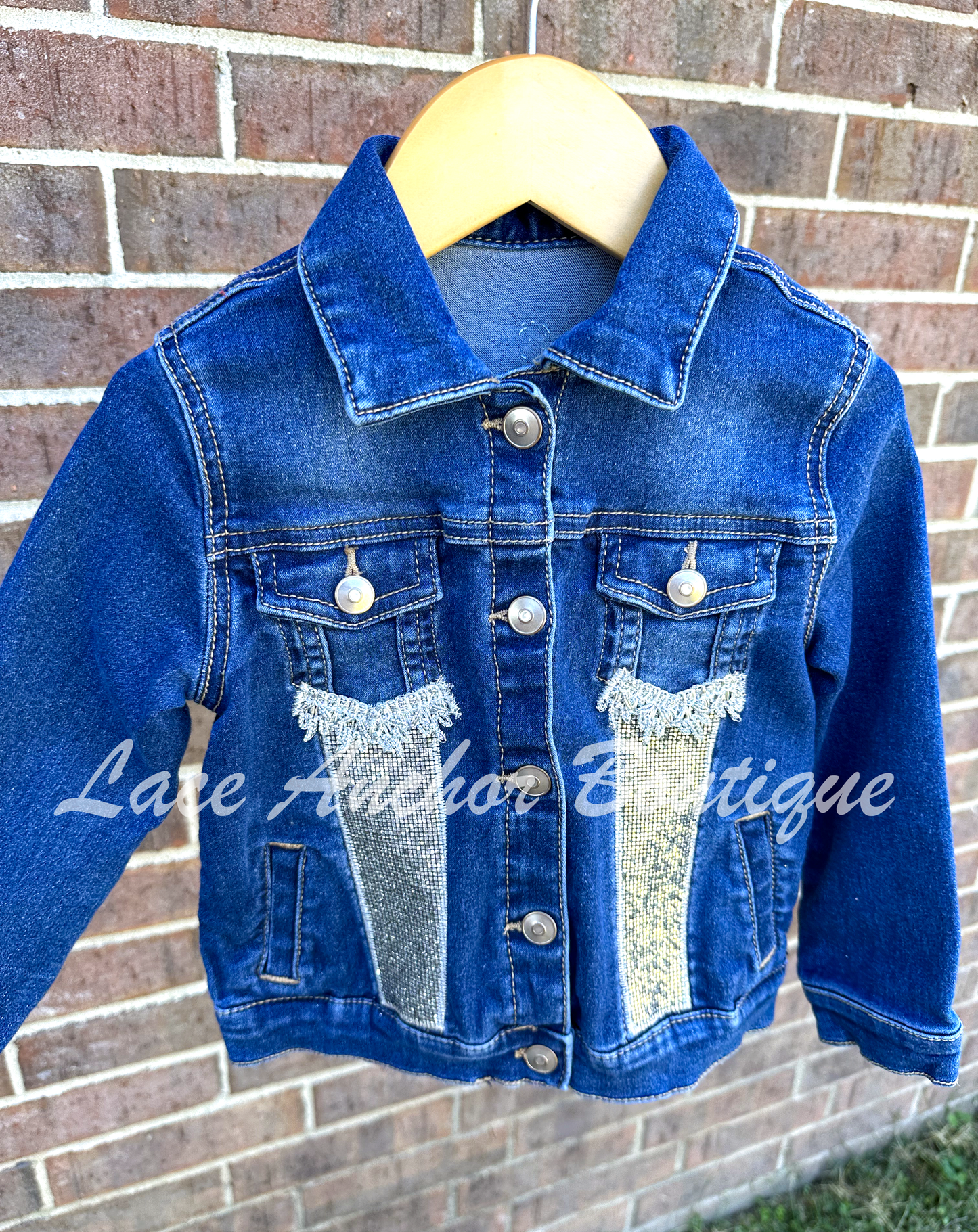 custom handmade upcycle toddler girls denim jacket withsilver disco faux leather patch and silver emboidered trim.