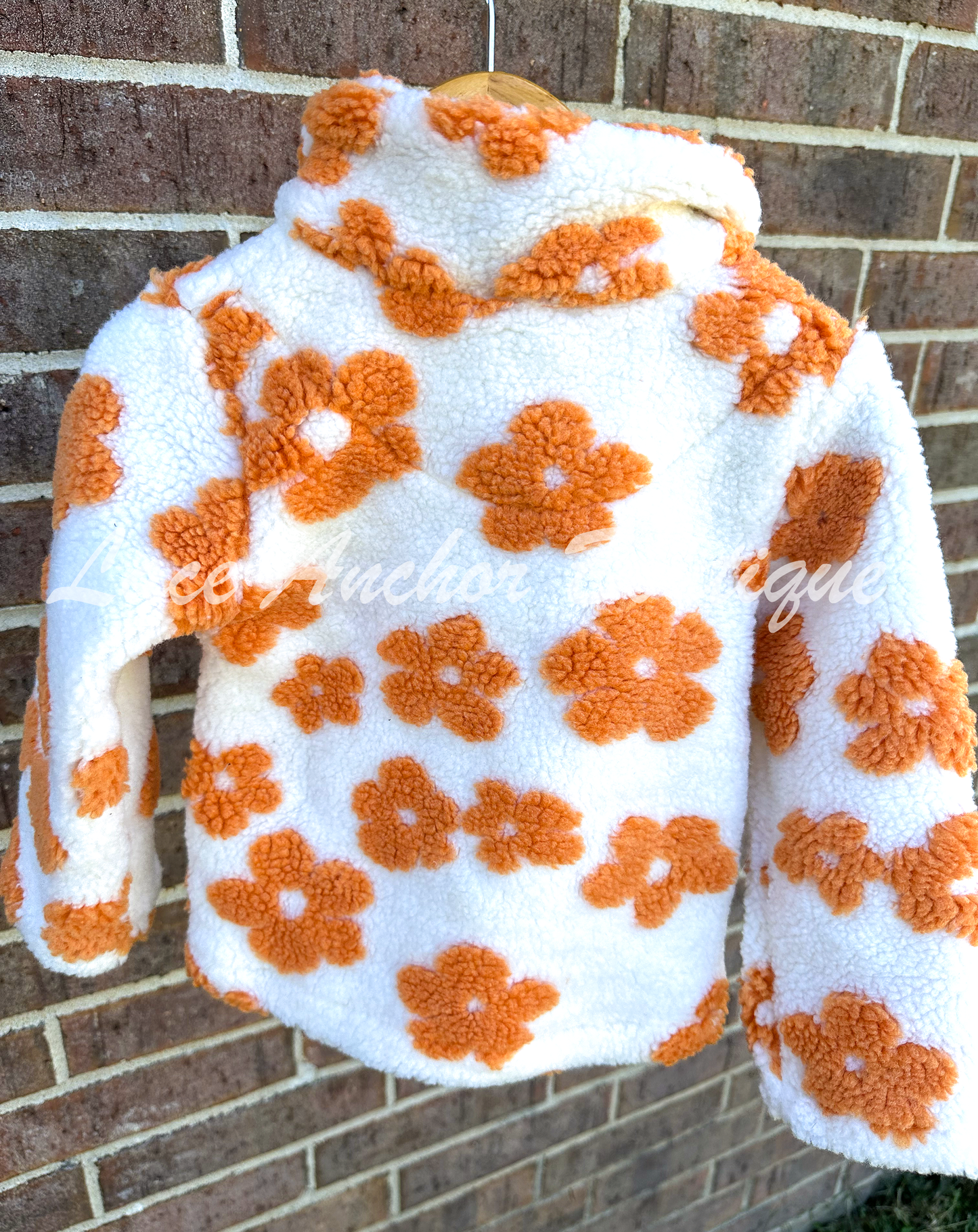 ivory sherpa quarter zip pullover with warm rust orange flowers all over