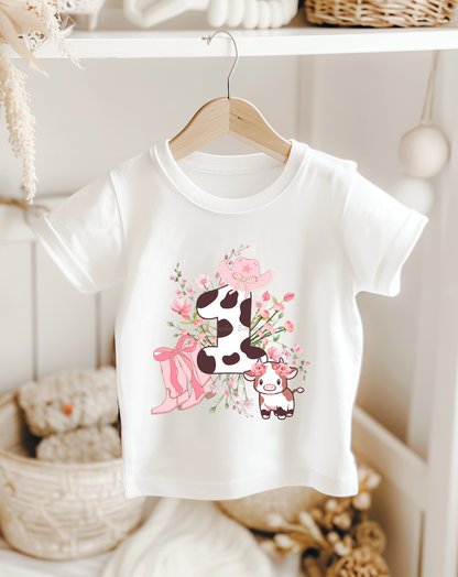 girly white western cow print 1st birthday tee shirt with bows and floral design