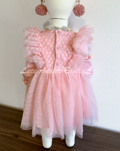 blush light pink long sleeve baby toddler girls dress with embroidered lace top, ruffled lace trim, and tulle tutu skirt.
