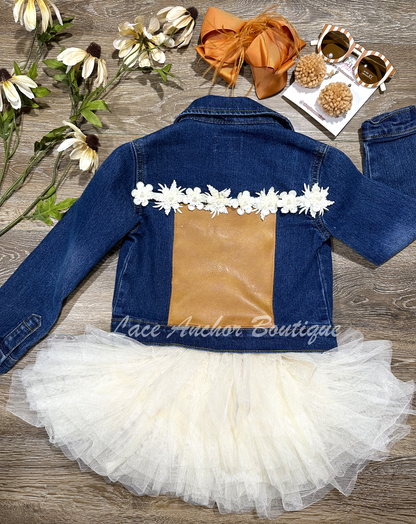 custom handmade upcycle toddler girls denim jacket with tan faux leather patch and ivory flower trim.