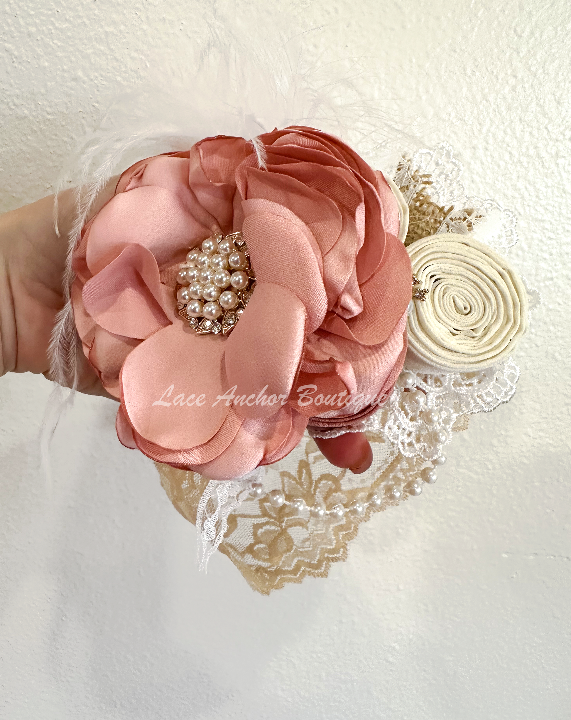 floral rhinestone, pearl, burlap, feather, and lace baby girls headband wrap. Flower girl elegant toddler hair bow in light blush pink.