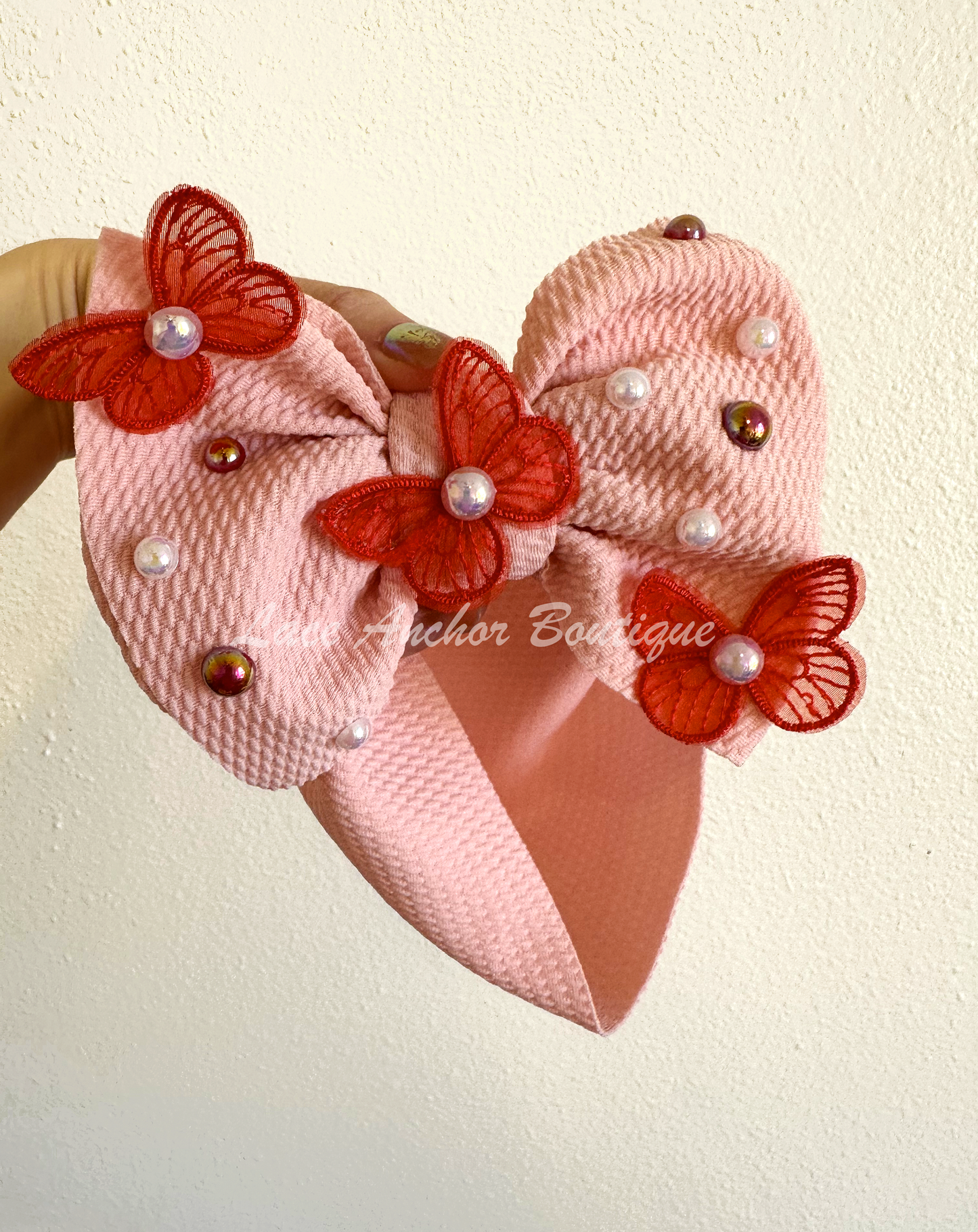 light blush pink baby girls bow headwrap with pearls, red pearls, red embroidered butterflies