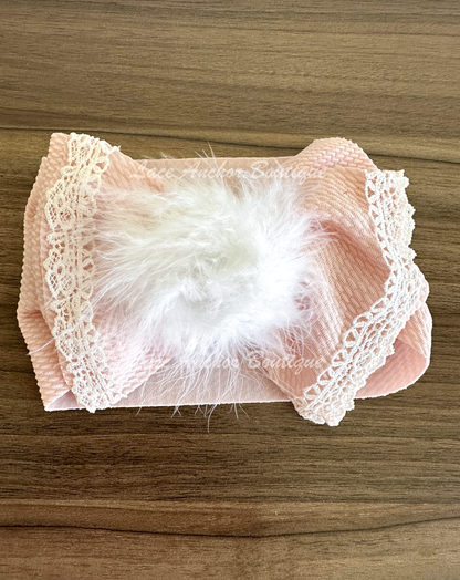 baby girls blush pink wrap hair bow with lace trim and fuzzy pom center