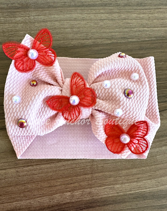 light blush pink baby girls bow headwrap with pearls, red pearls, red embroidered butterflies