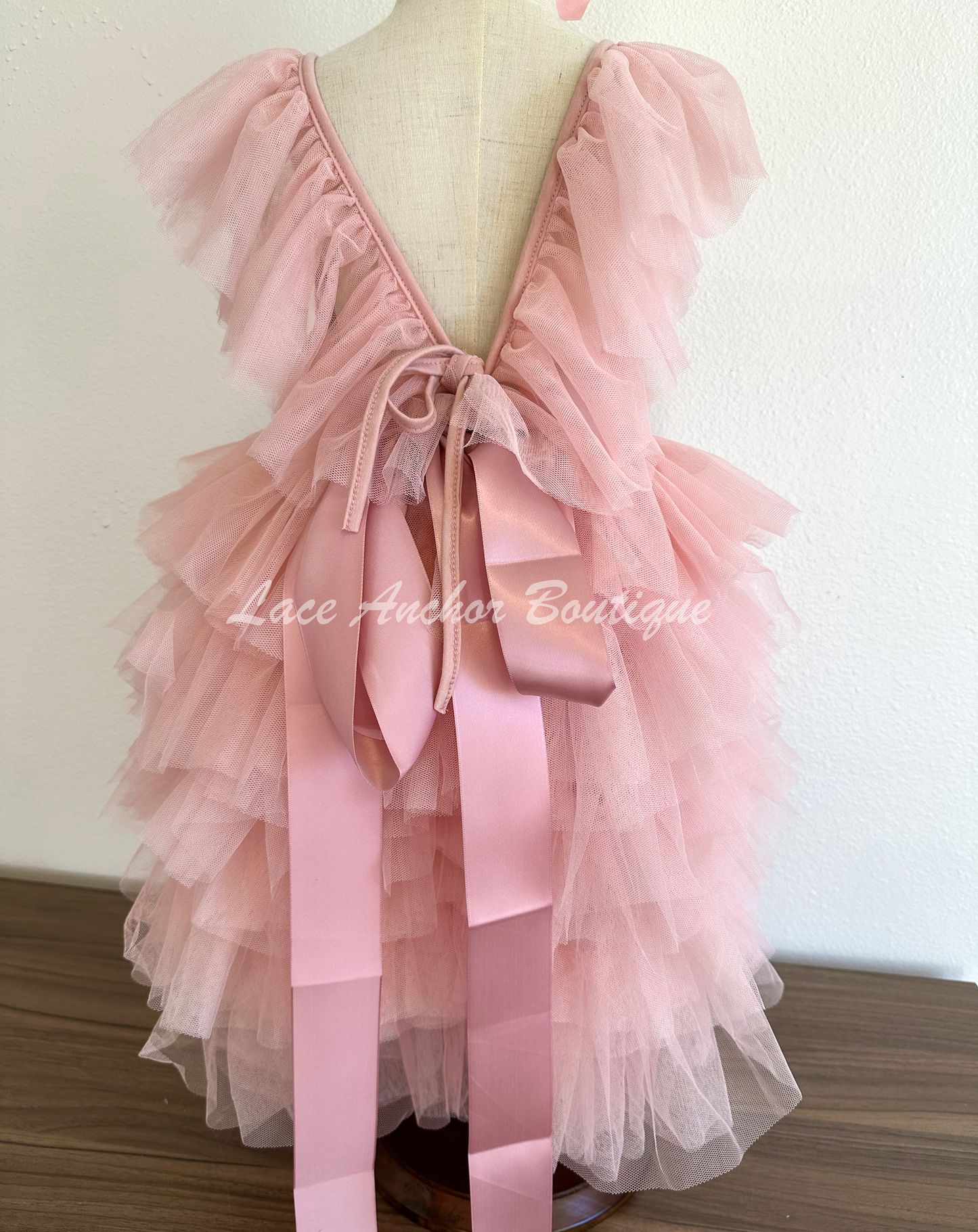 mauve pink girls lace tiered ruffle maxi dress, tulle sleeves, and tied floral flower sash. Spring flower girl dress.