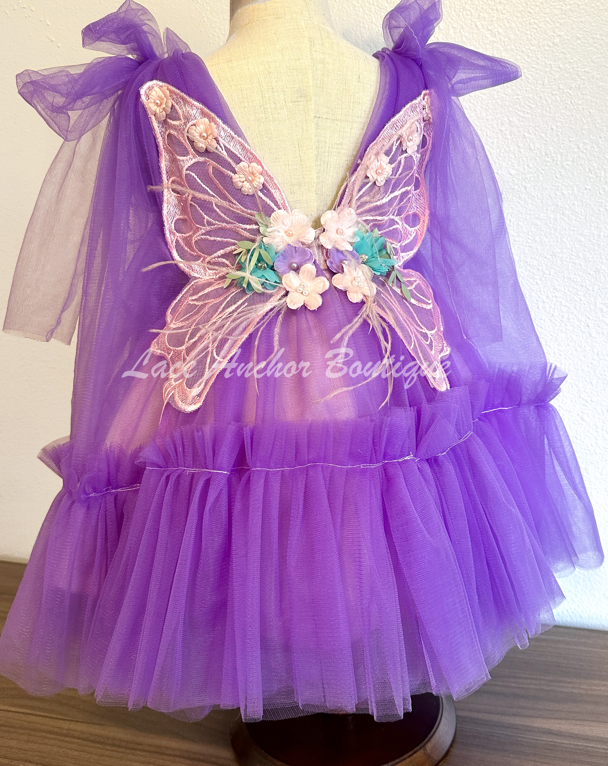 butterfly wing floral fairy toddler girls dress in violet purple.
