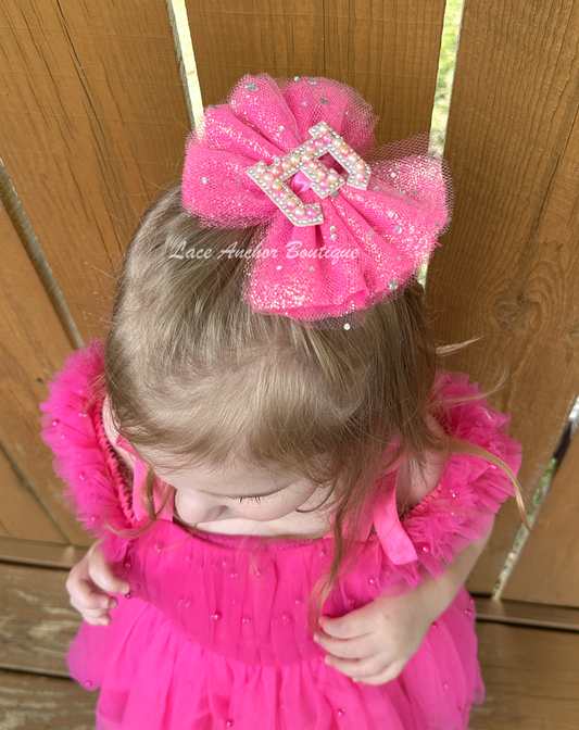 hot pink glitter hair bow for girls. Clip bows with rhinestone and pearl custom name letter.