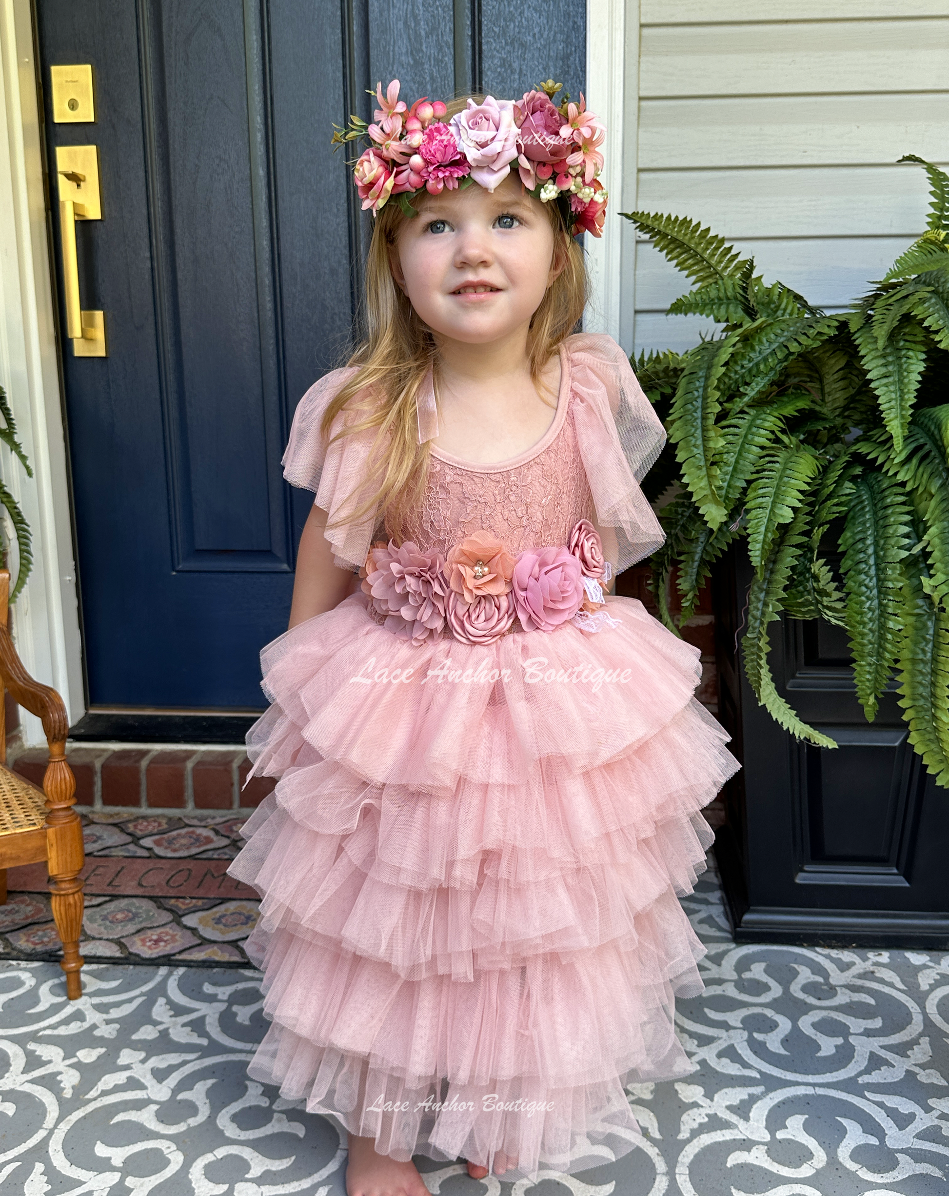 mauve pink girls lace tiered ruffle maxi dress, tulle sleeves, and tied floral flower sash. Spring flower girl dress.