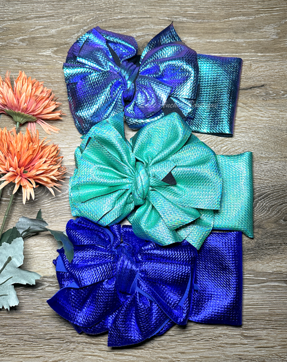 metallic turquoise, teal, and royal blue shiny glitter mega jumbo sized hair bow wrap for babies baby toddler