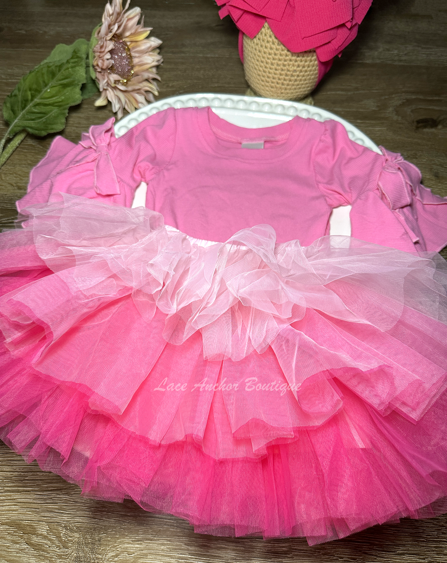 three colored pink tulle tutu with layers of ruffles