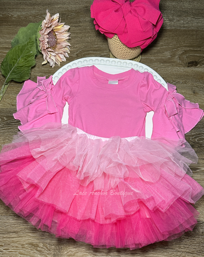 three colored pink tulle tutu with layers of ruffles