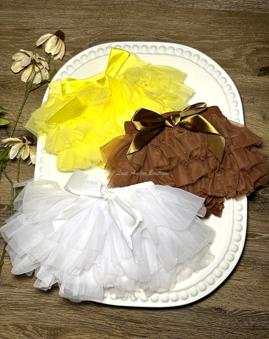 yellow, brown, and white bummie style tutu skirts made of tulle for girls