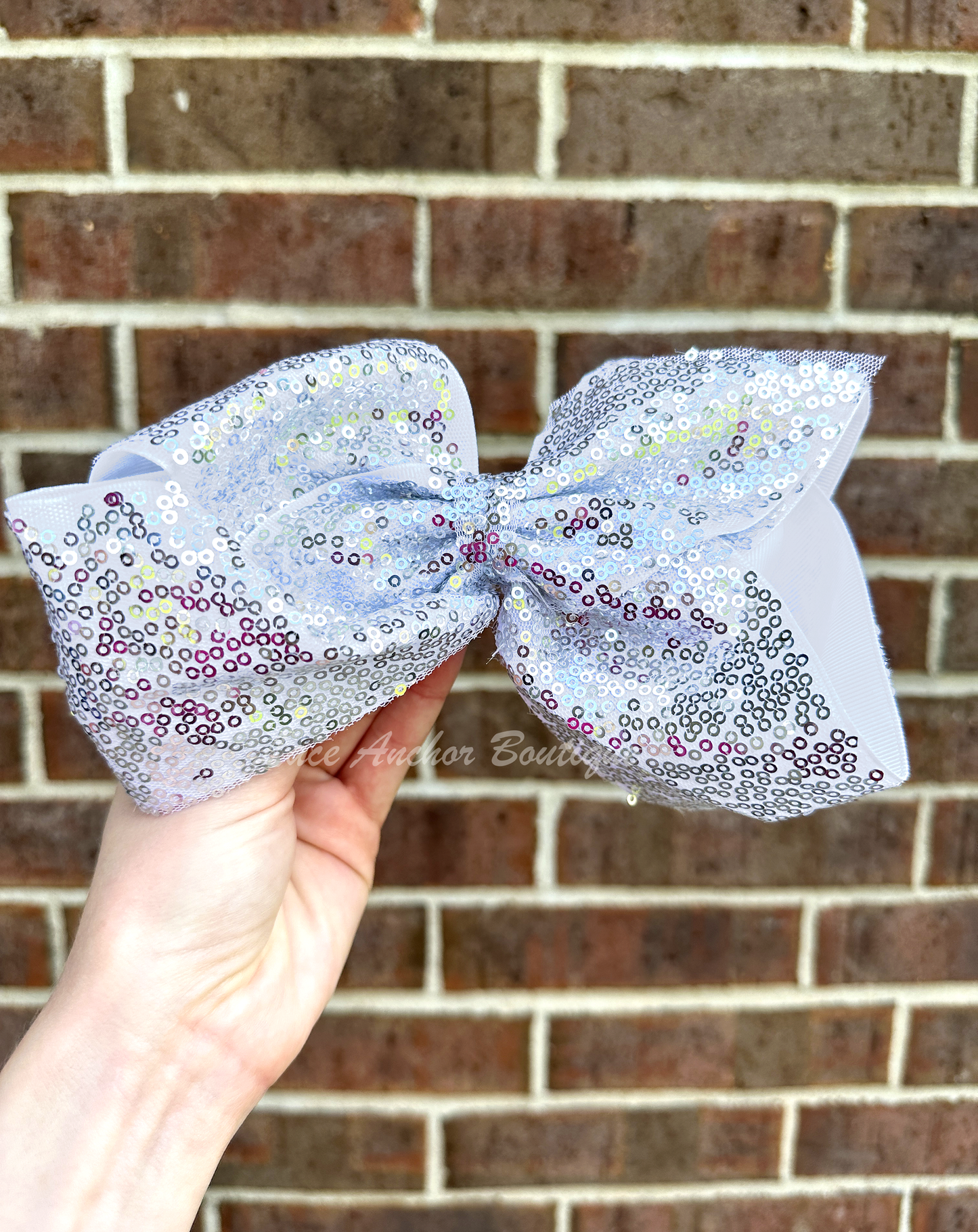 jumbo size girls ribbon bows covered in sequins in silver