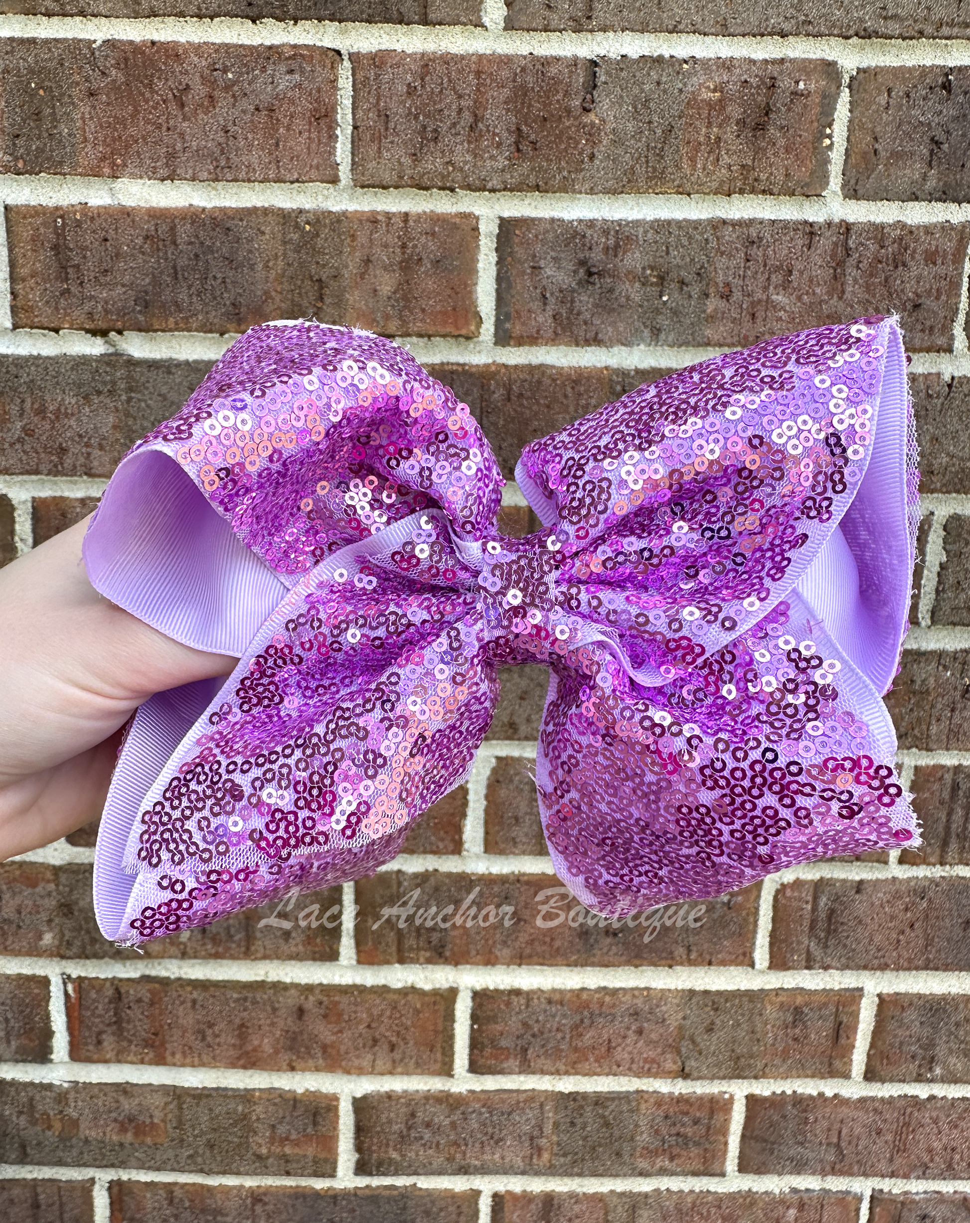 jumbo size girls ribbon bows covered in sequins in purple