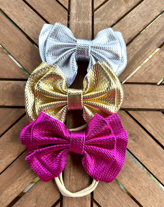 metallic hot pink, gold, and silver shiny glitter mega jumbo sized hair bow wraps for baby on nylon band