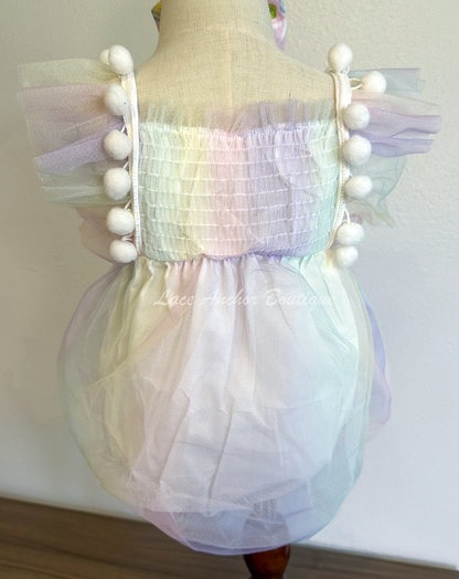 baby girls pastel lilac purple, yellow, blue, blue pink smocked tulle romper with candy themed big bow and matching hair bow with 3D sucker through it. Sweet One Candy Land Themed Outfit for birthday Photoshoots.