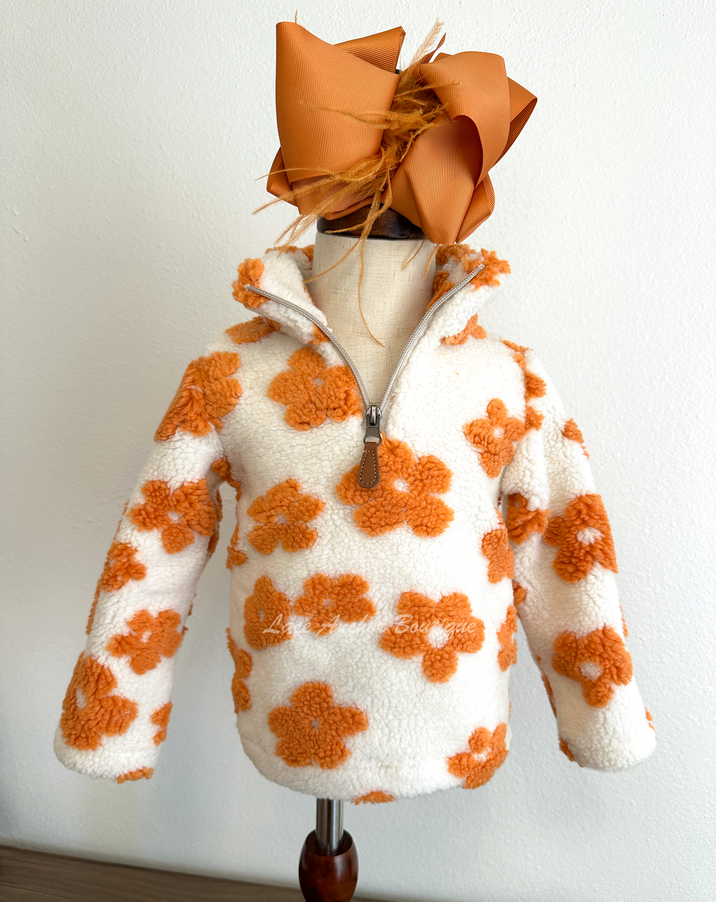 ivory sherpa quarter zip pullover with warm rust orange flowers all over