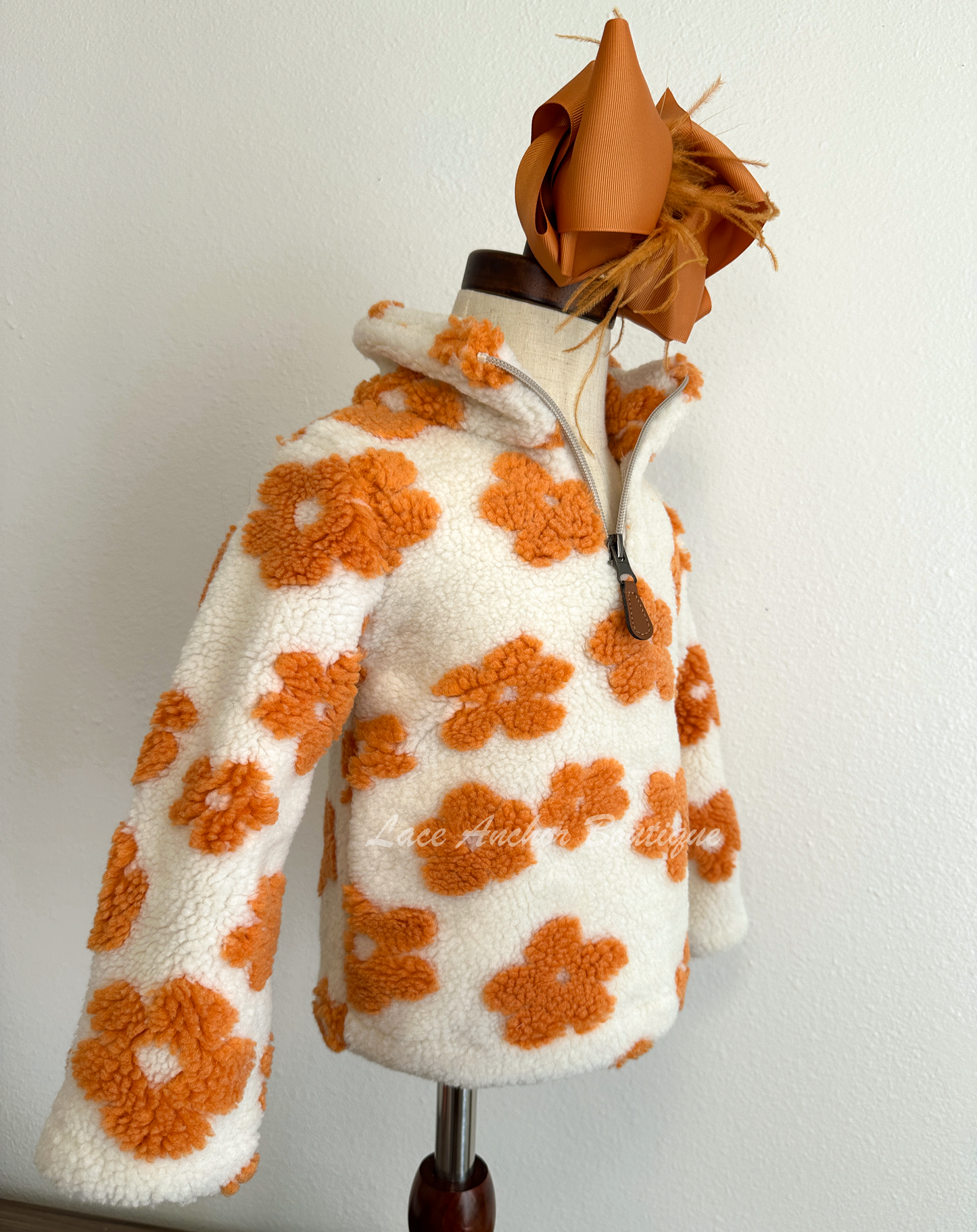 ivory sherpa quarter zip pullover with warm rust orange flowers all over