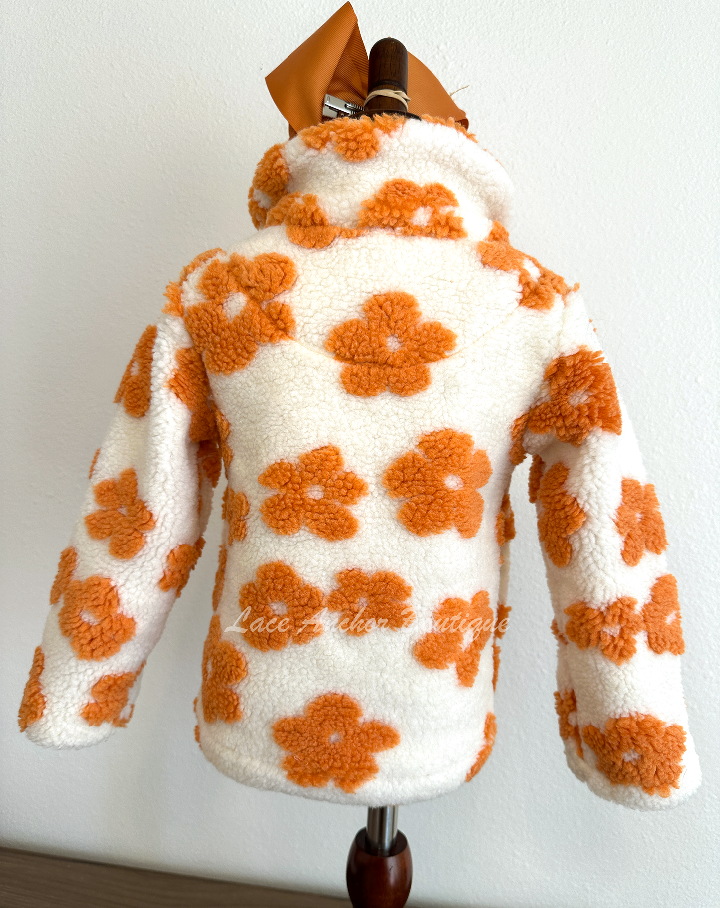 ivory sherpa quarter zip pullover with warm rust orange flowers all over