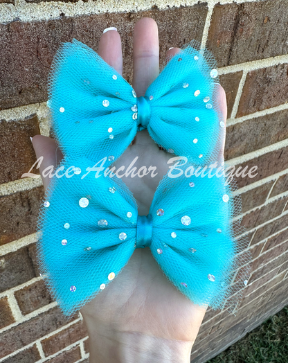handmade custom tulle girls hair bow piggie clips with silver squin sparkles and glitter in teal light blue