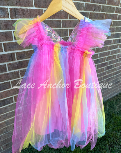 Neon rainbow fairy pink, blue, yellow, knee length tulle dress with iridescent butterfly wings attached for toddlers, babies, kids.