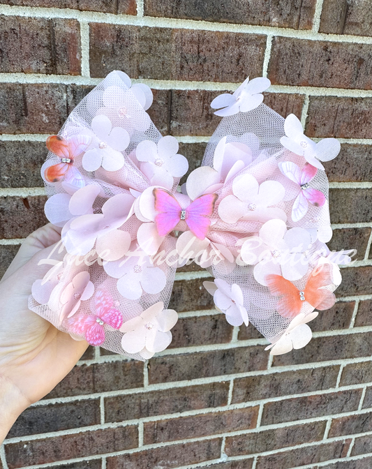 light blush pink tulle sailor style girls hair bow with butterflies