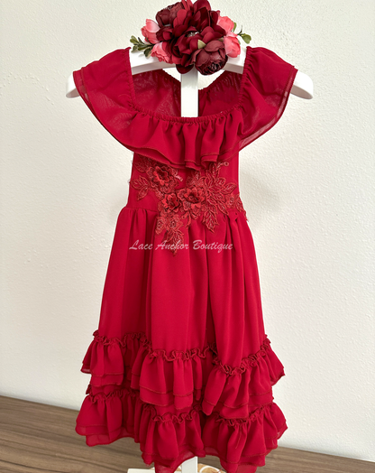 solid deep red ruffled layer dress with floral embroidered applique. Holiday sleeveless maxi dress.