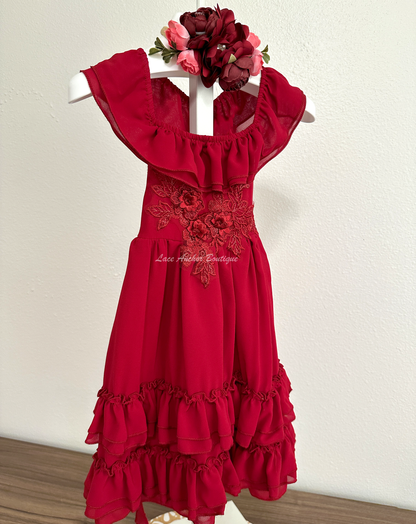 solid deep red ruffled layer dress with floral embroidered applique. Holiday sleeveless maxi dress.