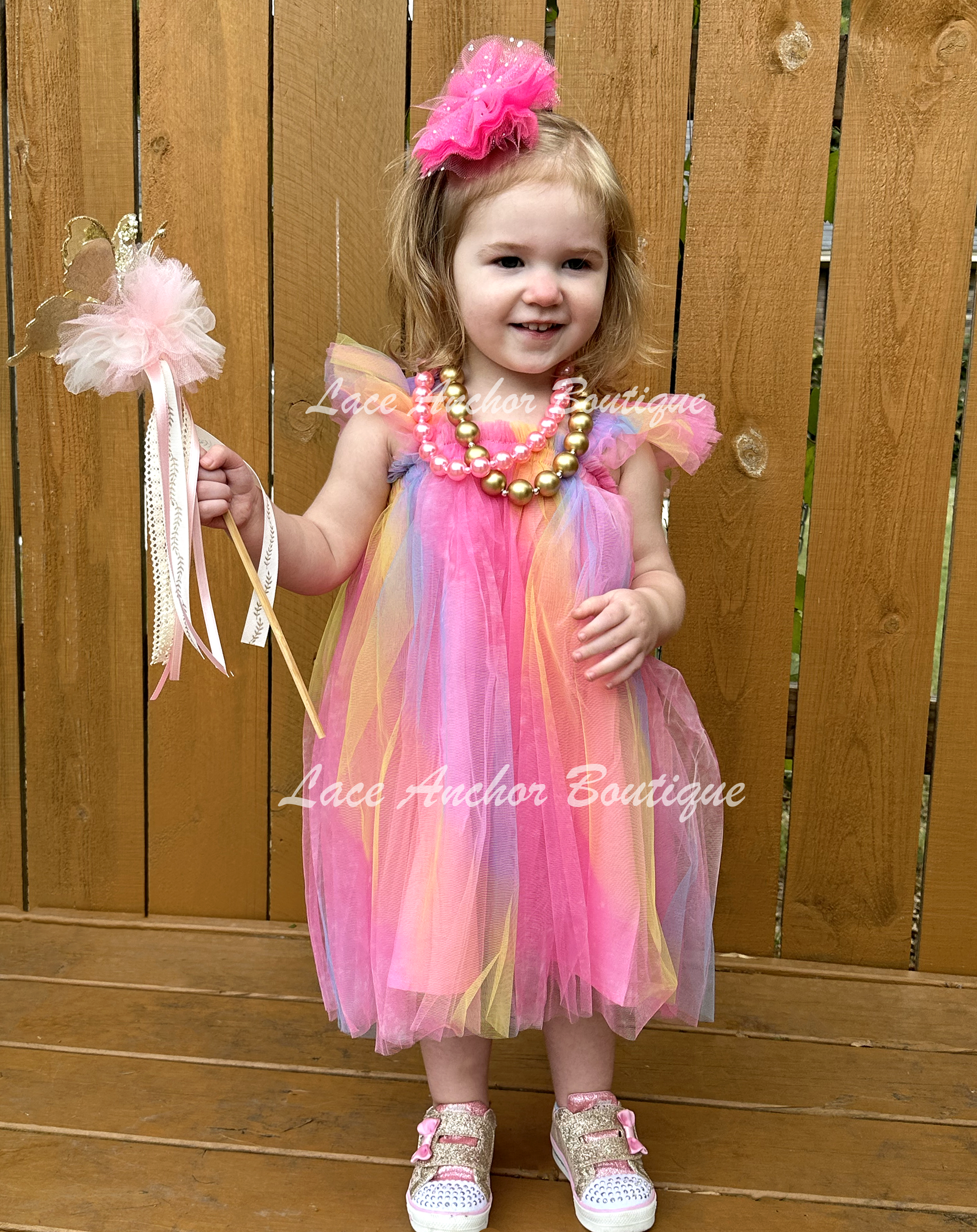 neon tulle dress Turn heads in this neon sheer tulle dress a romantic, mid-calf Villanelle style perfect for summer parties, photoshoots and festival fashion. Lightweight layers of neon tulle create a dramatic silhouette you'll