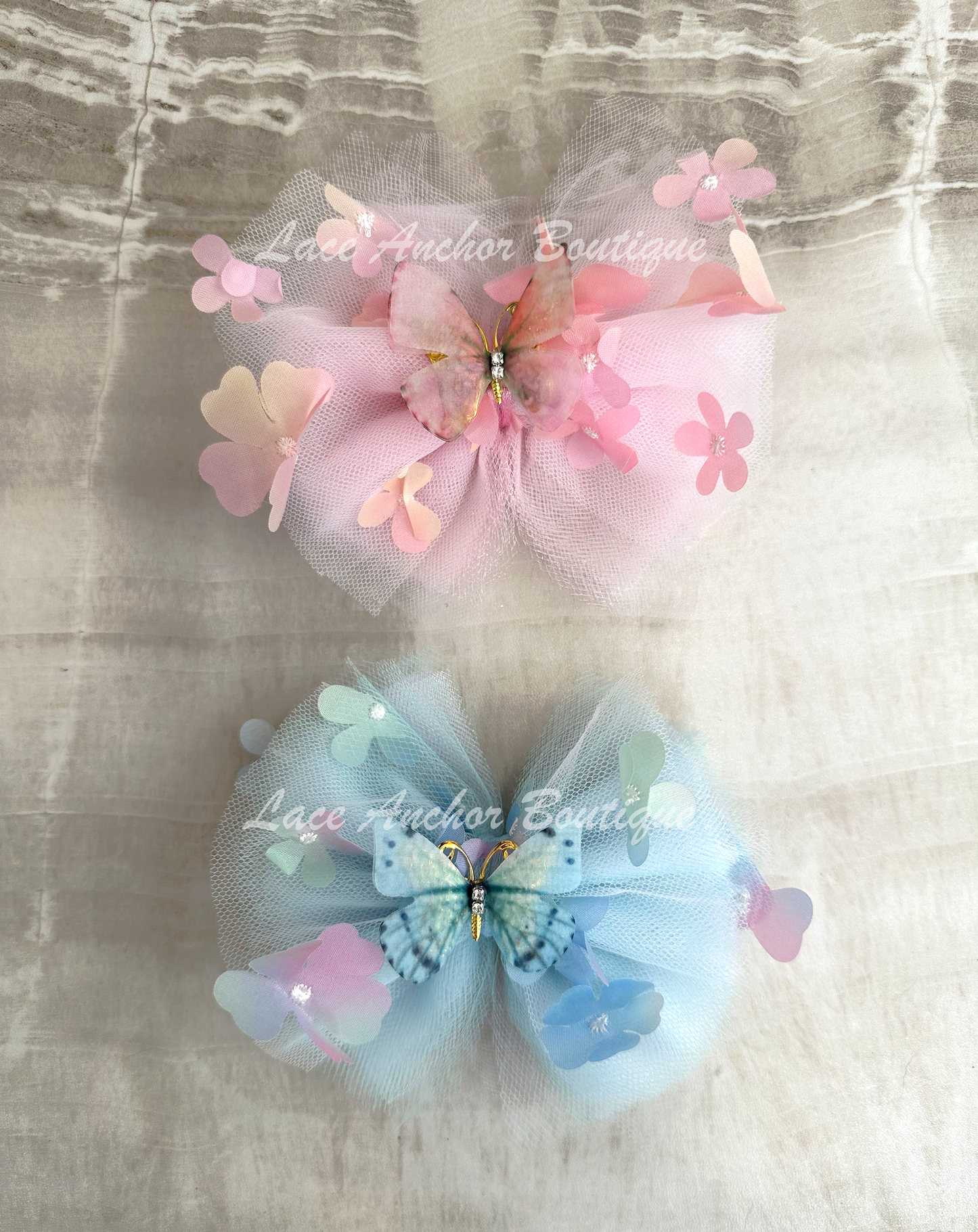 light pink or light blue tulle hair bow with flowers and gold butterfly center for toddler girls and up..
