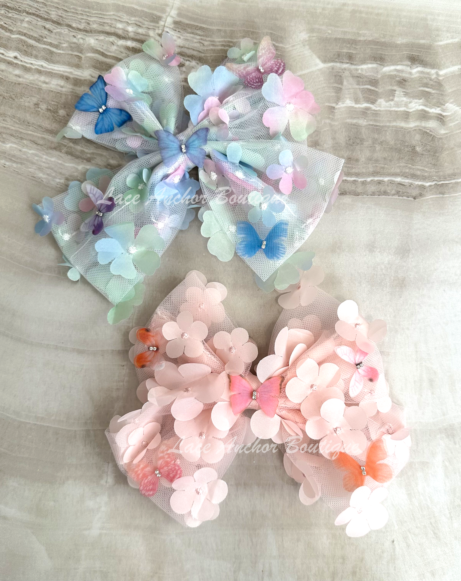 light blue or light pink tulle sailor style girls hair bow with butterflies
