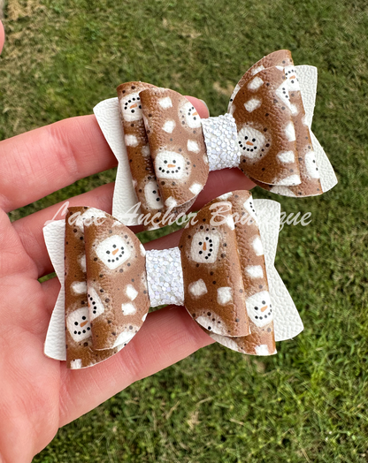 brown and white s'mores themed girls hair piggie bow. Faux leather hot cocoa marshmallow with face glitter girl hair clip piggies bow. Winter holiday toddler hair clips.