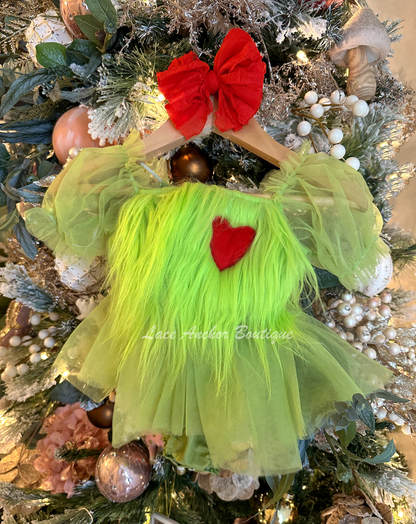 lime green baby girls romper with tulle skirt, puff sleeves, faux fur chest, smocked back, and embroidered red soft heart.