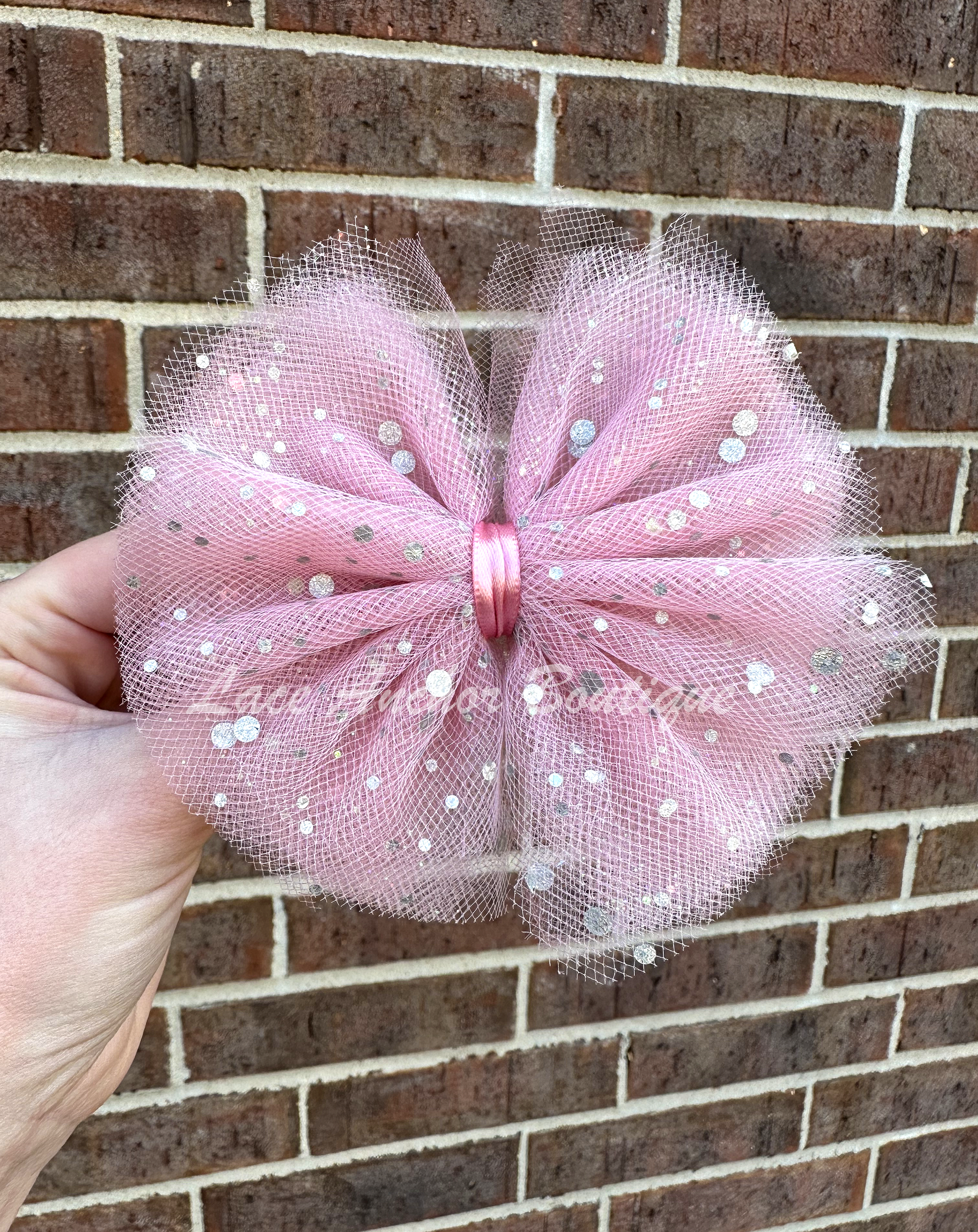 mauve pink tulle girls hair bow with silver sequin glitter specs