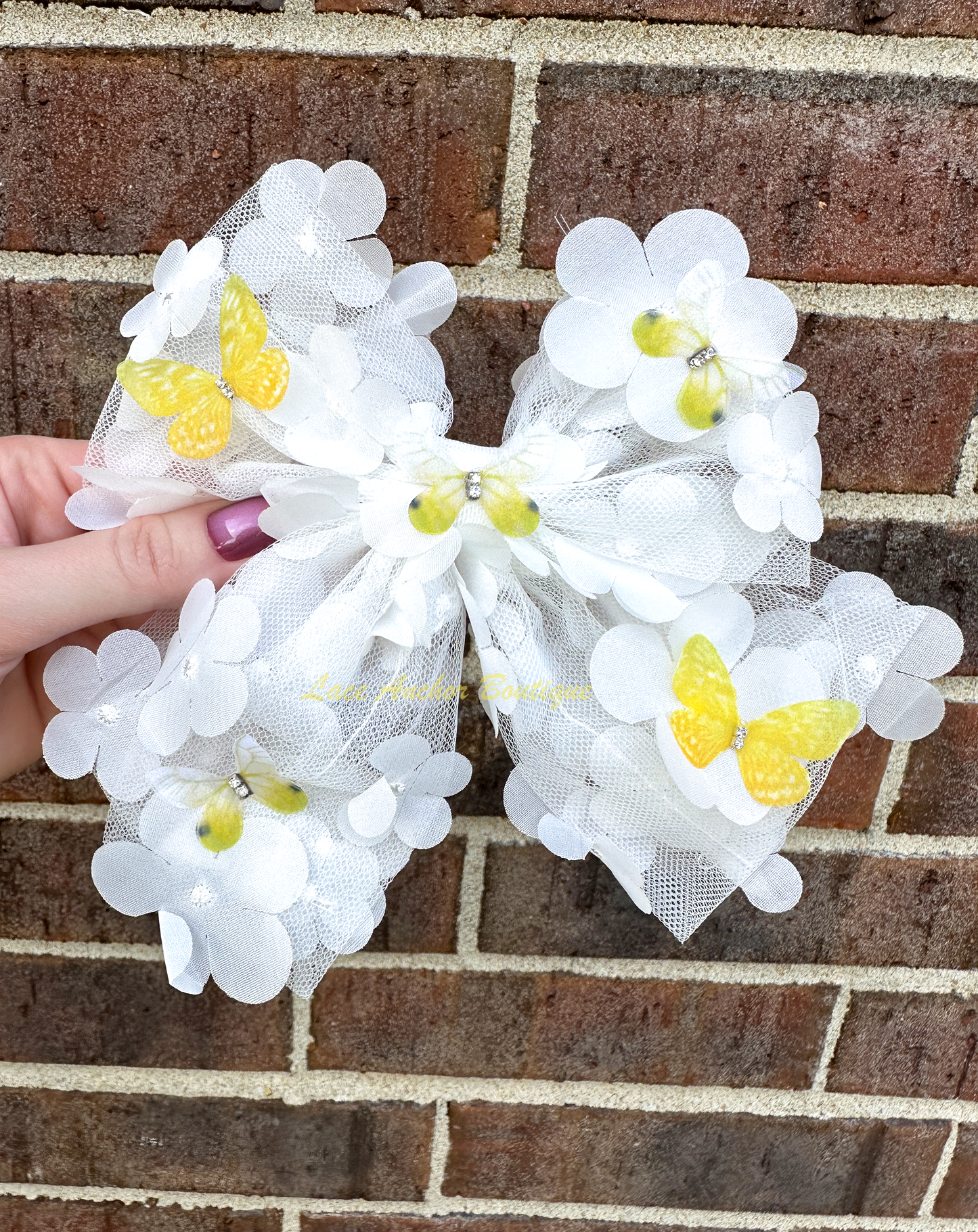 white tulle sailor style girls hair bow with yellow butterflies