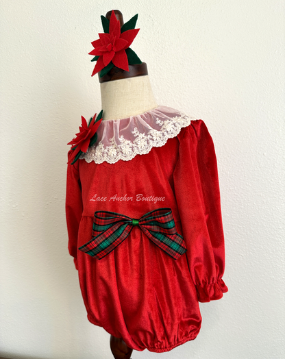 Christmas themed baby girls romper with red velvet, lace collar, 3D felt poinsettia flowers, and a vintage green and red bow.