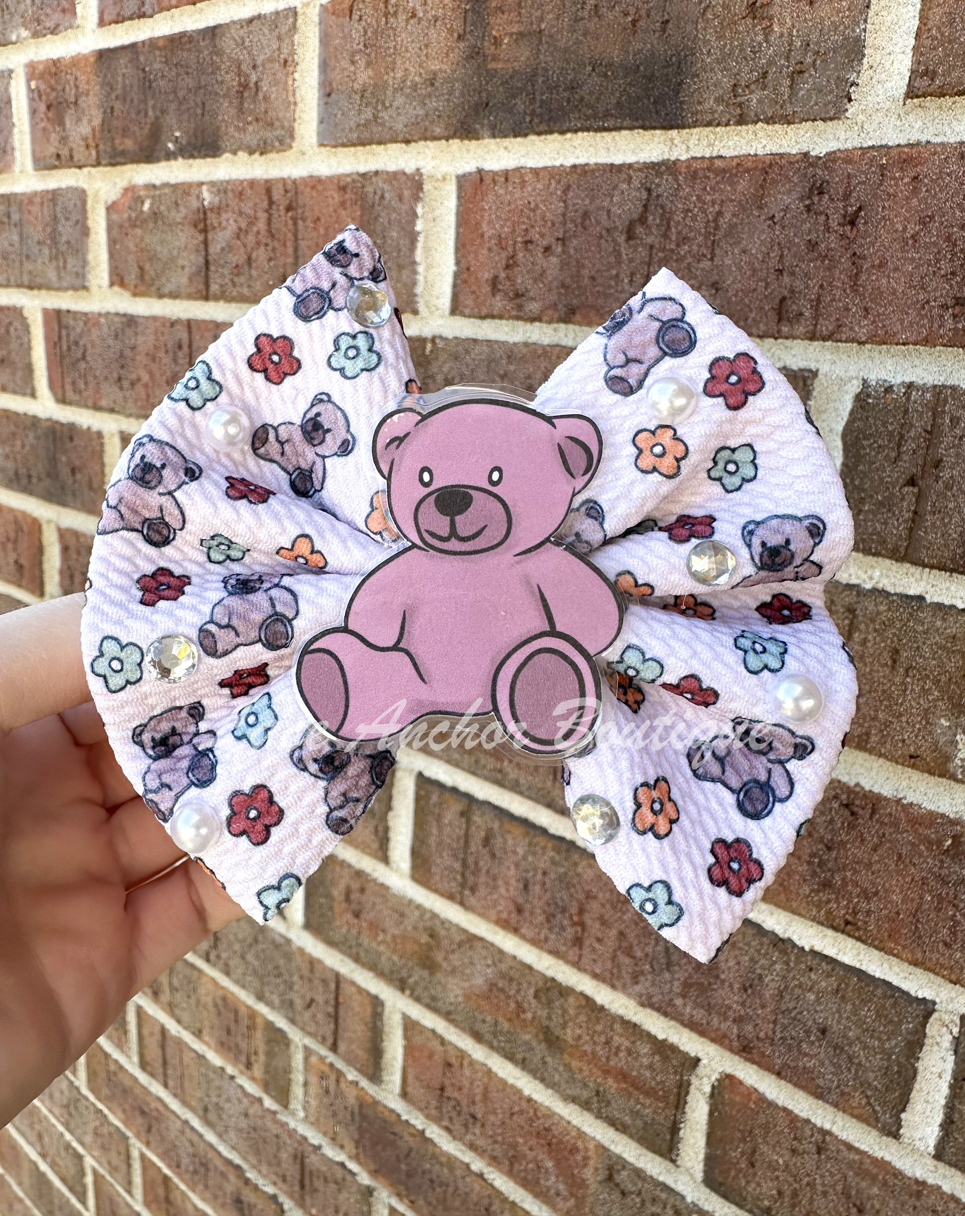 cream ivory custom handmade teddy bear and flower print baby girls bow on clip with rhinestones, pearls, and bear center.