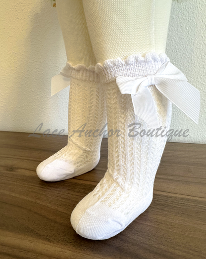 baby toddler girls socks. Eyelet knit crochet child's knee high sock with bow.