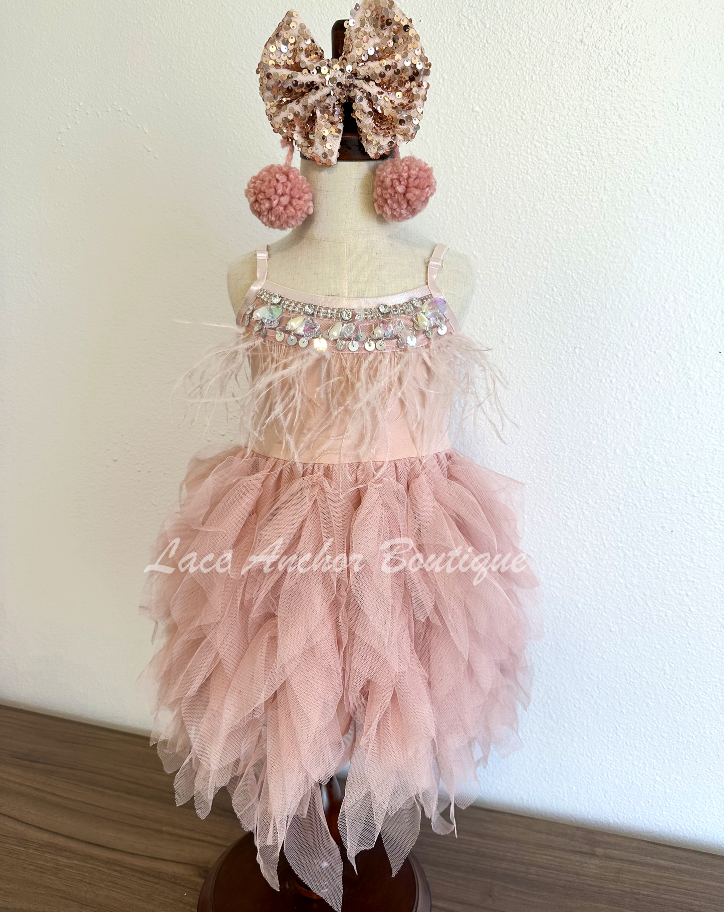 mauve rose pink fringe layered ruffled tulle skirt girl dress. Girls birthday princess dress with feathers, rhinestones, and sequins for toddlers. Youth party outfit with adjustable straps.