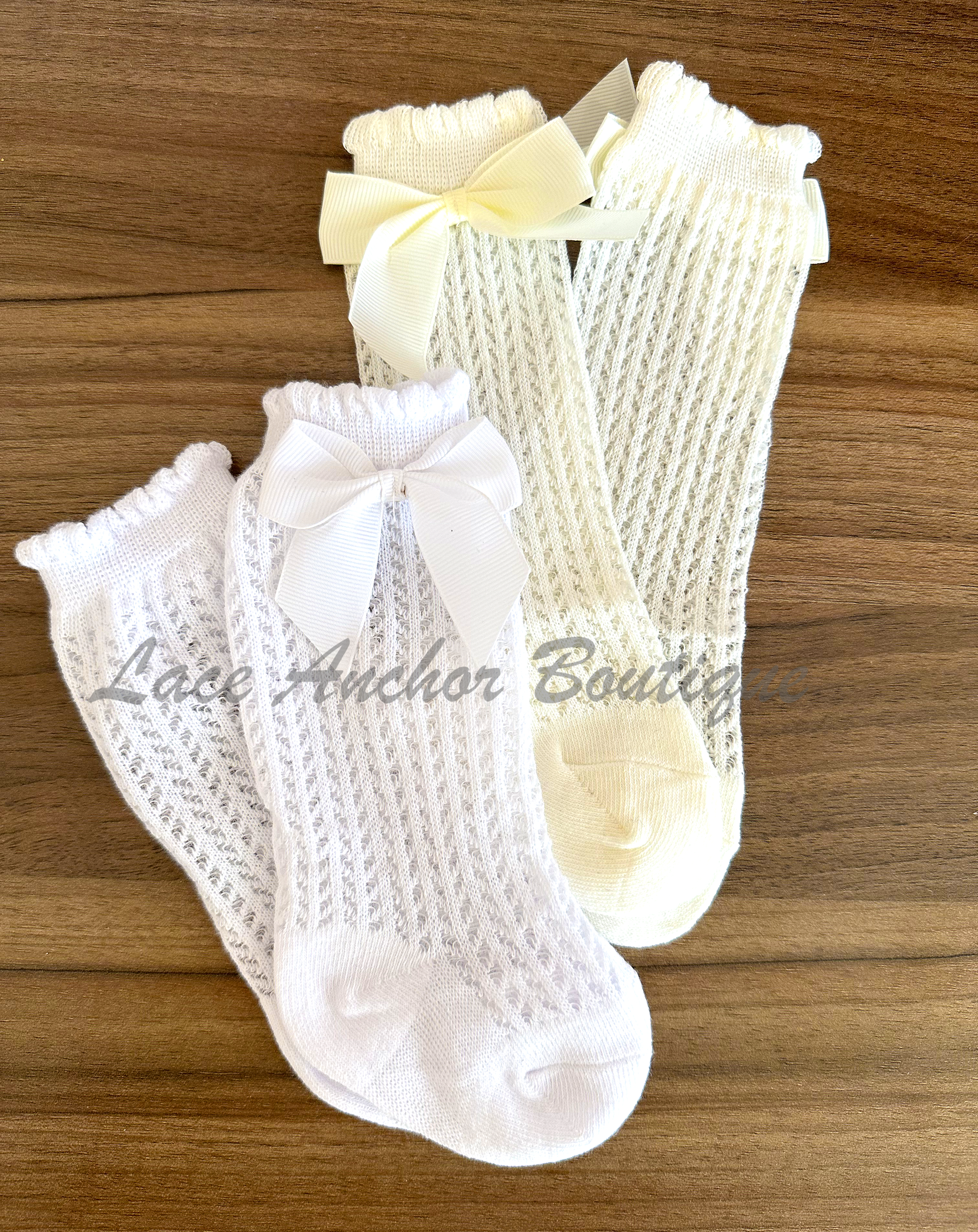 baby toddler girls socks. Eyelet knit crochet child's knee high sock with bow.