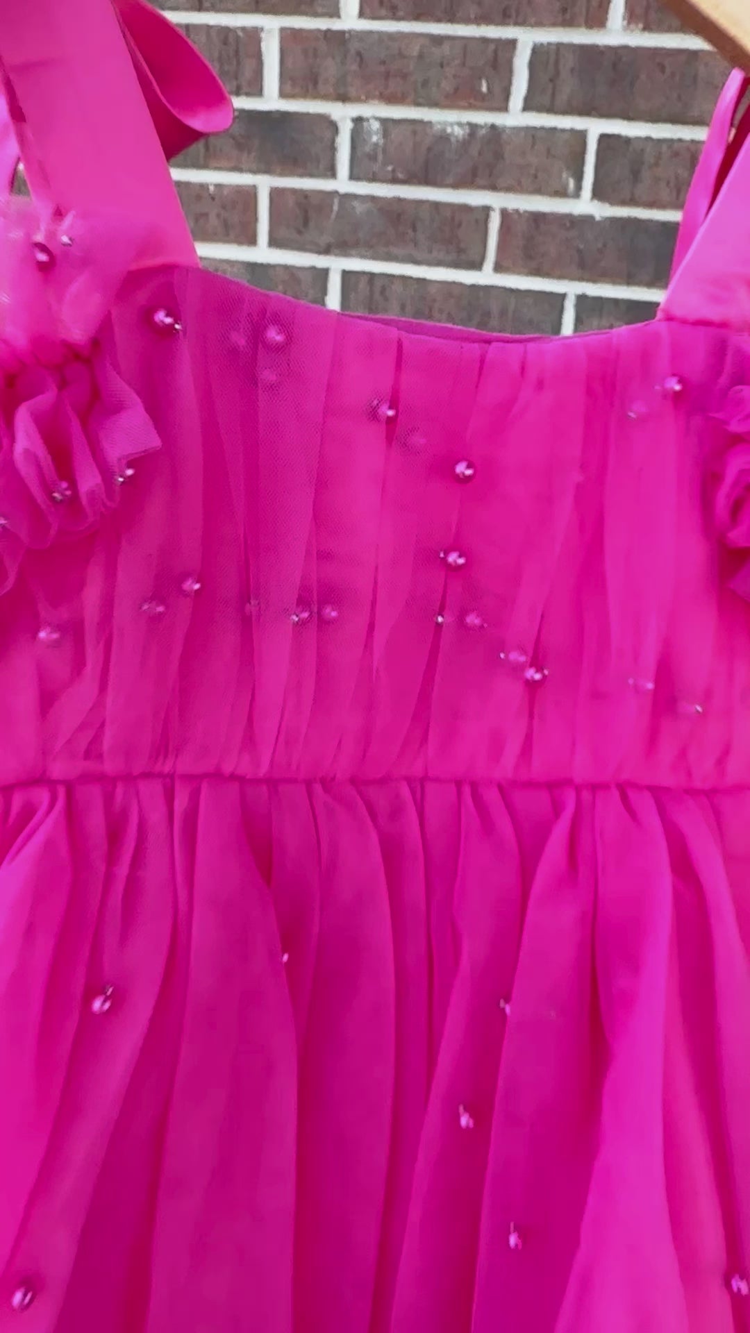hot pink tulle princess birthday girl dress with pink pearls and bow tied shoulders with ruffled off shoulder sleeves. Baby toddler youth girls tutu party dress.