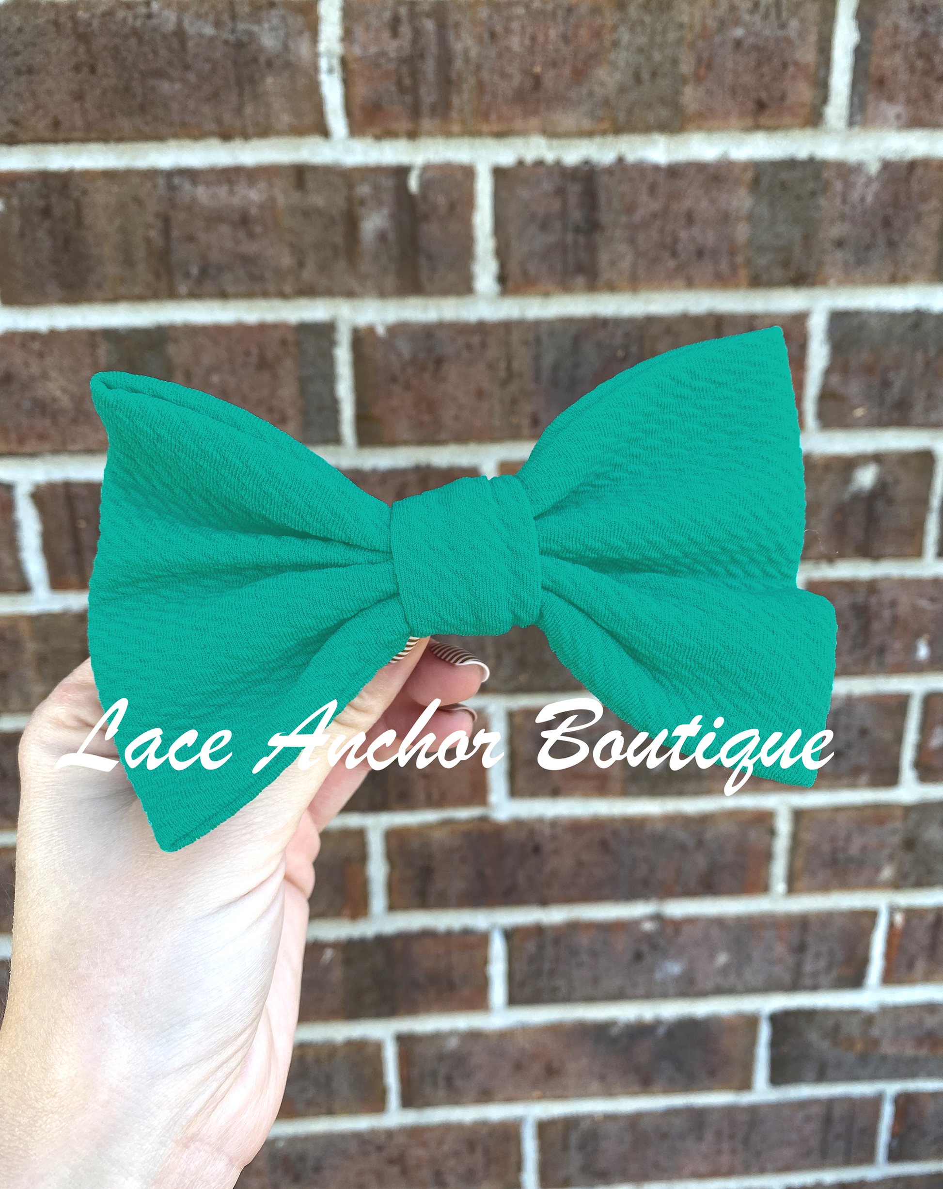 5" fluffy sold colored textured clip turquoise bow