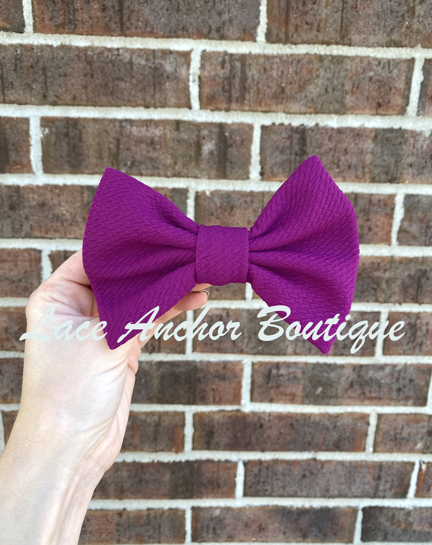 5" fluffy sold colored textured clip bright purple bow